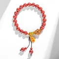 Traditional red cinnabar bead bracelet with handcrafted wooden flower and gold lucky charm - Emperor Cinnabar Peach Blossom Bracelet