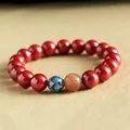 Traditional red cinnabar beaded bracelet featuring a blue cloisonné lucky bead detail - Emperor Cinnabar Style (Copper) / 10mm