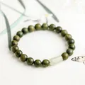 Natural green sandalwood beaded bracelet with a single pale jade accent bead - Women's Elastic Verawood Bracelet (8mm)