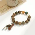 Handcrafted green sandalwood Buddhist prayer bead bracelet with ethnic tassel - Verawood Buddhist Beads Style / 10mm