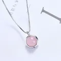 Elegant minimalist strawberry crystal necklace featuring a round pink stone on silver chain. - Rose Quartz (Silver Chain) / Rose Quartz Color