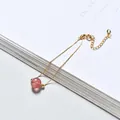 Elegant gold chain bracelet featuring a single round pink strawberry crystal bead - Gold Plated - Strawberry Quartz