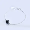 Elegant minimalist silver chain bracelet featuring a single black round bead variant - Platinum Plated - Obsidian