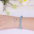 Light blue gemstone beaded bracelet set in Korean style on a delicate woman wrist - Aquamarine (Beaded Bracelet + Chain)