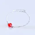 Minimalist silver chain bracelet featuring a single red strawberry crystal bead. - Platinum Plated - Red Agate