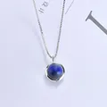 Elegant minimalist silver necklace featuring a deep blue circular pendant for women - Lapis Lazuli (Silver Chain)