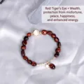 Elegant natural red tiger eye bead bracelet with star charm on silver silk background - Red Tiger Eye