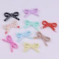 Perline fiocco in acrilico 27x48mm con motivi a quadri e pois per accessori per gioielli fai da te - 1 Pezzo / colori misti casuali