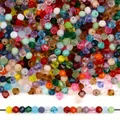 4mm bunte facettierte Bicone-Kristallglasperlen für DIY-Schmuckherstellung und Basteln - 4mm / 100er Pack / Zufällig Gemischt