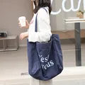 Stylish navy blue linen canvas tote bag with white lettering for casual daily use - Blue