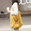 Yellow linen tote bag with 'C'est avou' letter print, casual Korean style canvas shoulder bag - Yellow