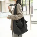 Casual Japanese style black checkered nylon messenger bag with unique knotted strap design - Black Plaid