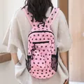 Stylish pink polka dot nylon backpack for women with matching small pouch accessory - Pink