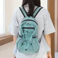 Japanese style casual plaid nylon backpack featuring adjustable turquoise drawstring cords - Green