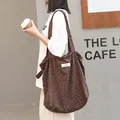 Casual brown polka dot canvas tote bag featuring drawstring pleats and single shoulder strap - Coffee