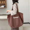 Stylish Japanese style brown linen tote bag with white Salomé letter print for daily use - Coffee