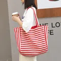 Casual red and white striped canvas tote bag with a minimalist Japanese fashion style - Red