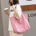 Versatile pink and white striped canvas tote bag for casual everyday fashion outfits - Pink