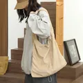 Casual beige suede-like drawstring hobo bag with stylish pleated detail for women - Apricot