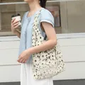 Stylish white floral hollow-out lace shoulder bag for women with a casual Korean aesthetic - Apricot