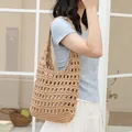 Stylish khaki hand-woven cotton hollow shoulder bag with an inner drawstring pouch - Camel