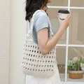 Trendy white hand-woven cotton hollow out shoulder bag featuring an inner drawstring pouch - White