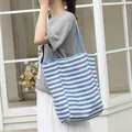 Large casual blue and white striped canvas tote bag with a minimalist Japanese design - Blue