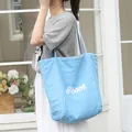 Elegante bolso tote de nailon azul con estampado Beach blanco, bolso de mano casual estilo coreano - Azul