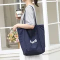 Elegante bolso tote grande de nailon azul marino para mujer con letras 'Beach' blancas - Azul marino