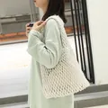 Chic white woven cotton rope underarm bag with a functional drawstring inner pouch - White