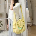 Japanese style casual yellow nylon crossbody bag featuring letter print and knot strap - Yellow