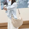 Chic cream PU leather crescent hobo bag for women featuring a minimalist retro design - Apricot