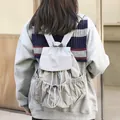 Light grey casual nylon drawstring backpack with stylish pleated details and side pockets - Light Gray