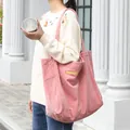 Stylish pink corduroy shoulder tote bag featuring yellow maaa letter embroidery for women - Pink