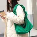 Stylish green corduroy shoulder bag for women with retro drawstring design and casual vibe - Green