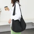 Casual black nylon crescent shoulder bag for women with minimalist hobo design - Black