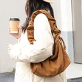 Retro brown corduroy shoulder bag with ruffled strap and drawstring closure - Brown