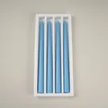 Detailed view of 4 light blue tapered candles neatly packed in a white decorative box - 4Pcs Set / Blue