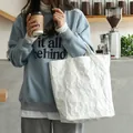 Stylish white crinkled DuPont paper shoulder bag in a casual Japanese retro lifestyle setting - White