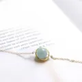 Elegant gold chain bracelet featuring a lustrous round aquamarine bead set in a ring - Aquamarine Bracelet (Gold Plated)