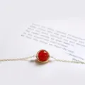 Elegant gold chain bracelet featuring a round polished red agate gemstone bead - Red Agate Bracelet (Gold Plated)