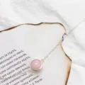 Elegant minimalist silver chain bracelet featuring a round polished rose quartz gemstone - Rose Quartz Bracelet (White Gold Plated)