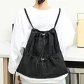 Stylish black drawstring backpack in crinkled nylon fabric for daily casual use. - Black
