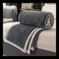Plush dark gray milk velvet flannel blanket with cream trim displayed rolled on a cozy bed - 100*150cm Single Blanket / Gentleman Grey