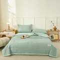 Green and white checkered pure cotton summer quilt displayed in a cozy, bright bedroom setting - Green Plaid
