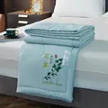 Light blue mosquito repellent summer quilt with herbal mugwort print on white bed linen. - Artemisia Style (85968) / 110x150cm / Light Blue
