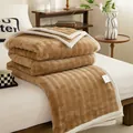 Soft brown milk fleece blanket with white trim and wavy texture for cozy office naps - Camel