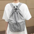 Japanese style casual gray nylon drawstring backpack with fashionable pleated design - Gray