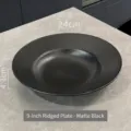 Elegant 9 inch minimalist matte black ceramic plate featuring a unique spiral texture - Spiral Hat Plate / 9 inch / Matte Black