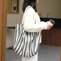 Casual black and white striped canvas tote bag with large capacity for daily travel - Black Striped Style / Black